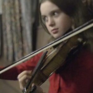 Lucy playing violin closeup